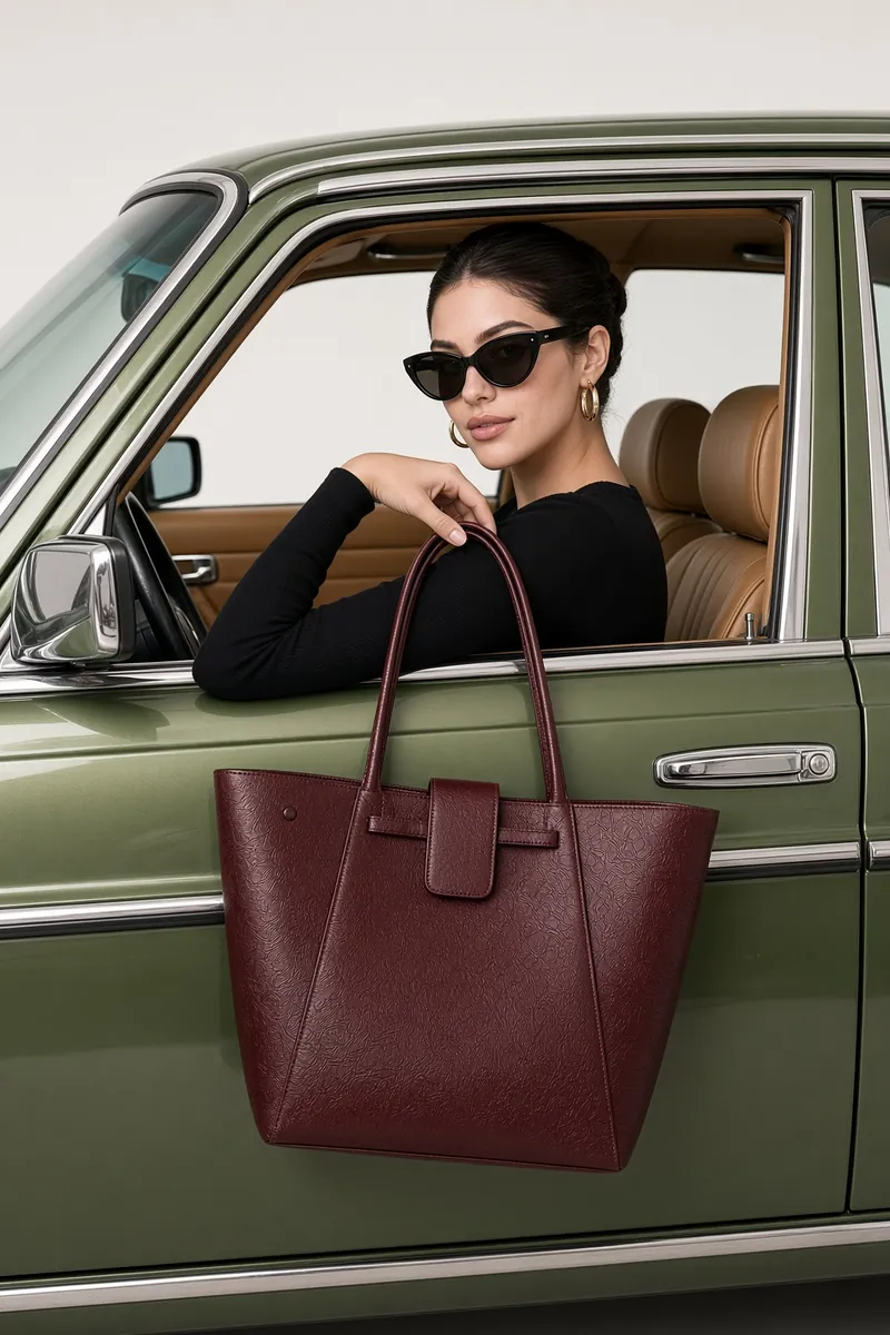 Burgundy Tote At Vintage Car Window Editorial